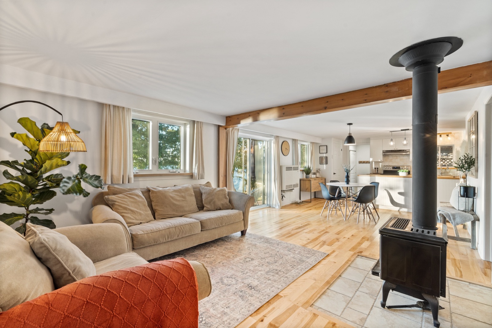 Open living room, kitchen and wood-burning fireplace